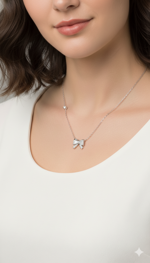 silver-toned crystal bow pendant necklace (Copy)