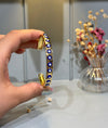 gold-plated evil eye cuff bangle
