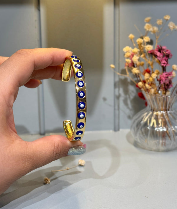 gold-plated evil eye cuff bangle