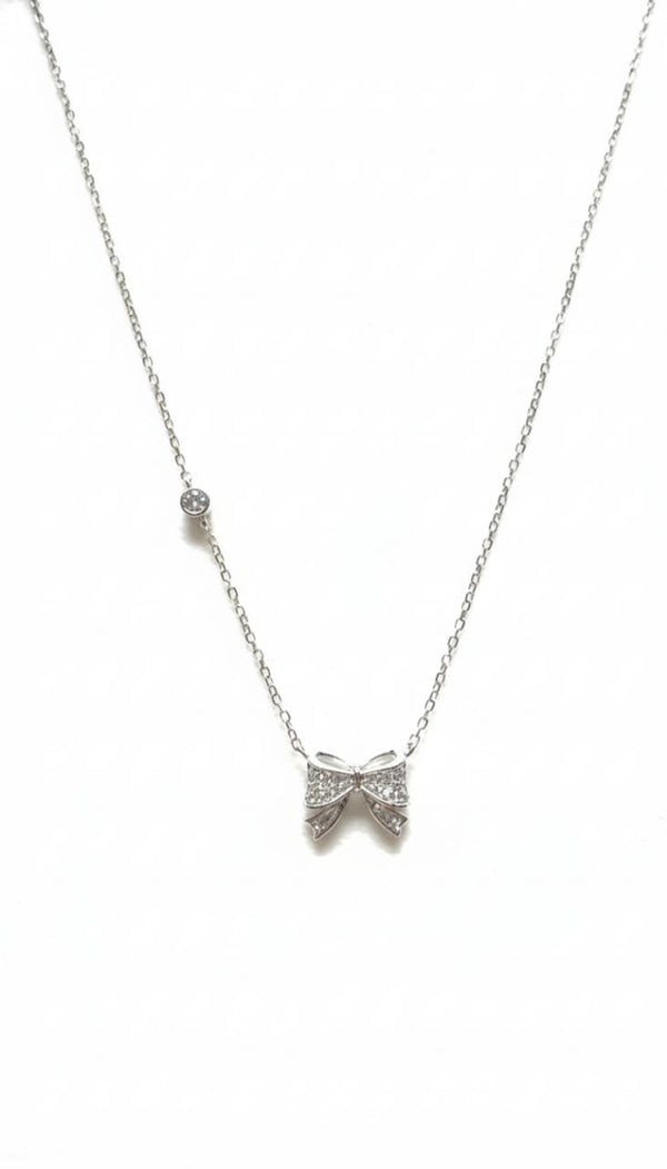 silver-toned crystal bow pendant necklace (Copy)